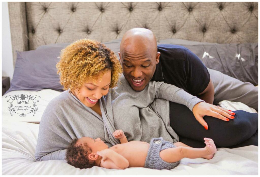 Adorable natural at home newborn pictures with family in their downtown Oakland home by Nightingale Photography.