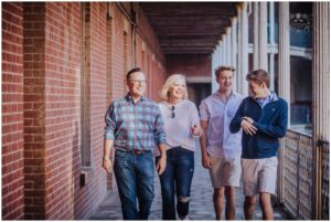 family walks through fort point for casual family photos