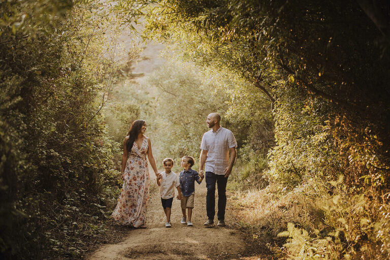 gorgeous professional photography of couple and twin boys walking in marin headlands