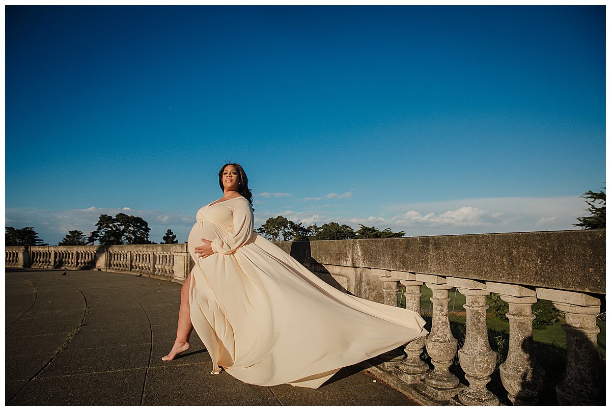 photo of a pregnant woman in front of the legion of honor in san francisco for a maternity photo session