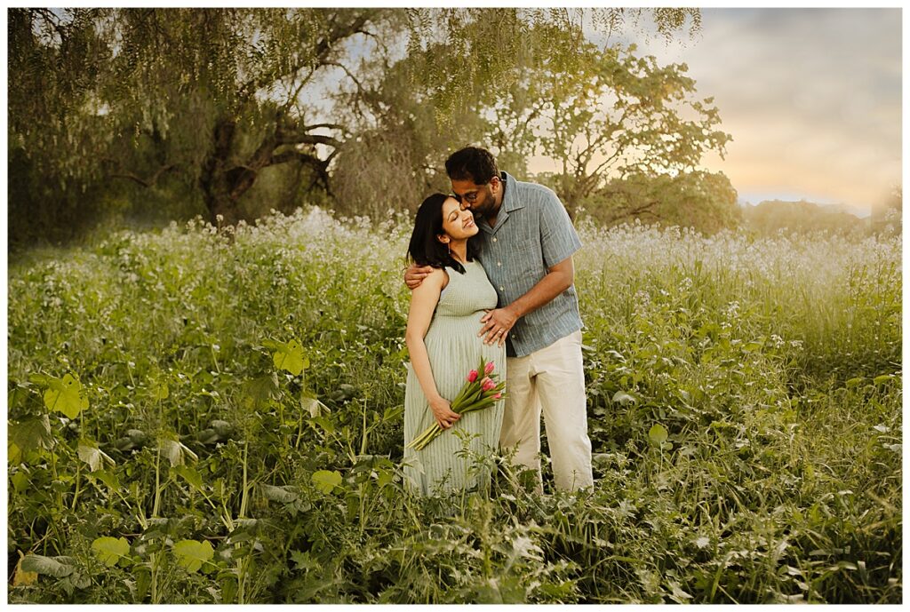 St. Louis Family Photographer. A pregnant women in west county St. Louis poses with husband for maternity session