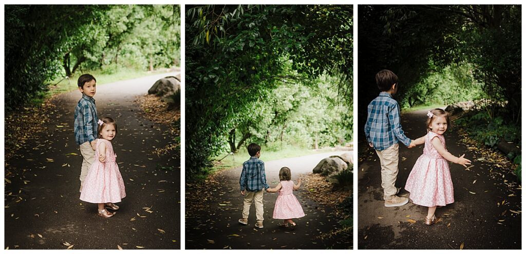 young children walk in the park in Town and Country, Missouri