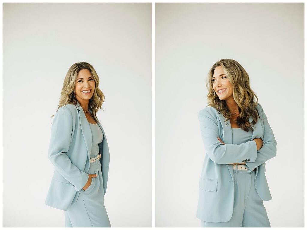 female realtor in the san francisco wears a blue suit and stands in a white studio for professional headshots